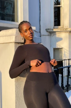 Tala DAYFLEX OPEN BACK LONG SLEEVE TOP - SHADOW BLACK -Sportswear Store DAYFLEX RESTOCK BLACK TOP LEGGINGS